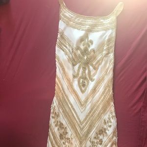 Beaded gold on white gown